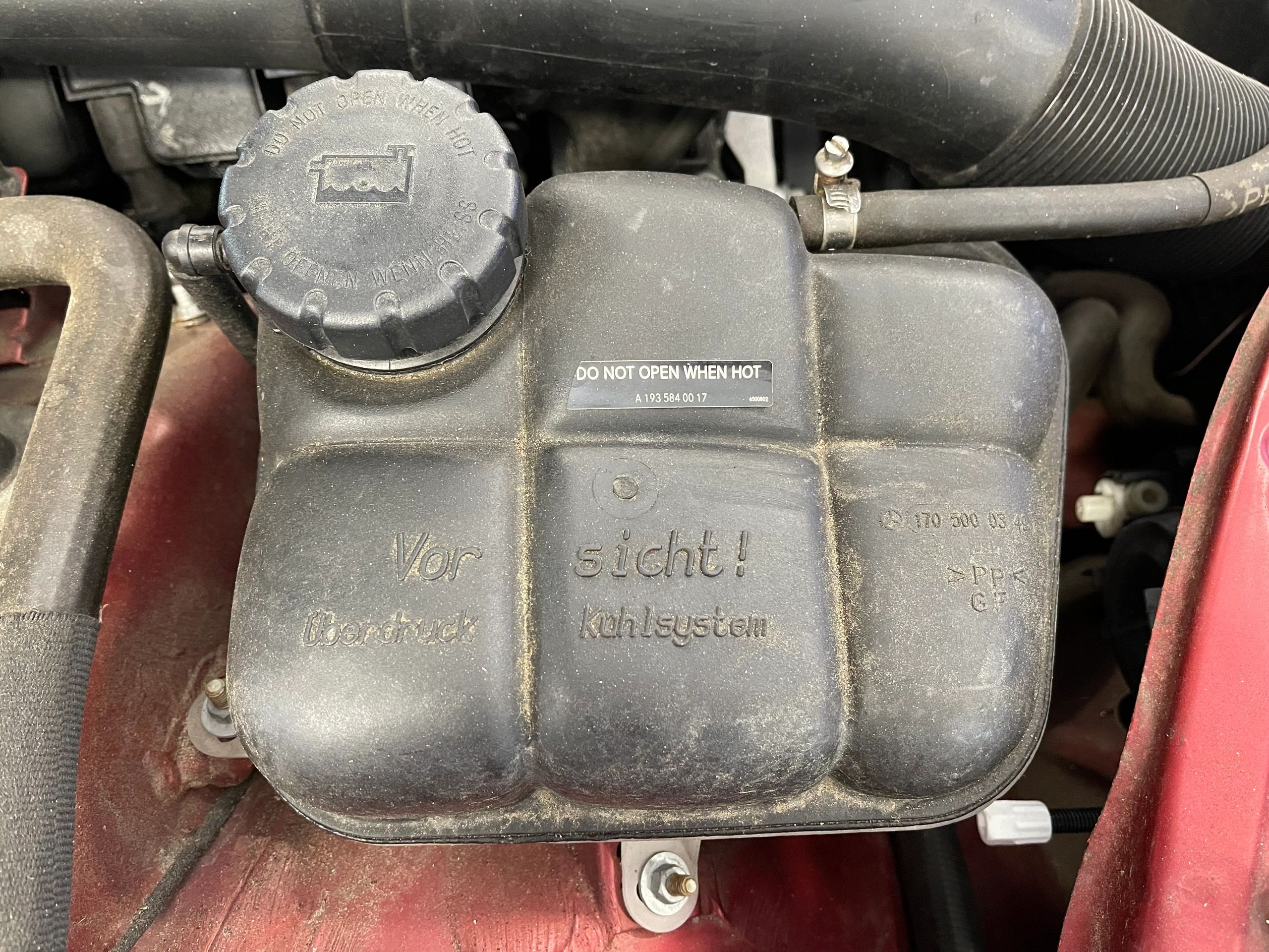 What does coolant do in a car?